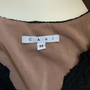 Sleeveless black lace shirt